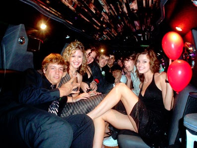 people inside the limo having birthday party