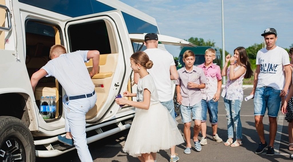 image of kids getting into limo before birthday party