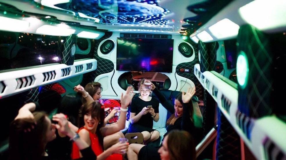 image of people inside limo during their birthday party