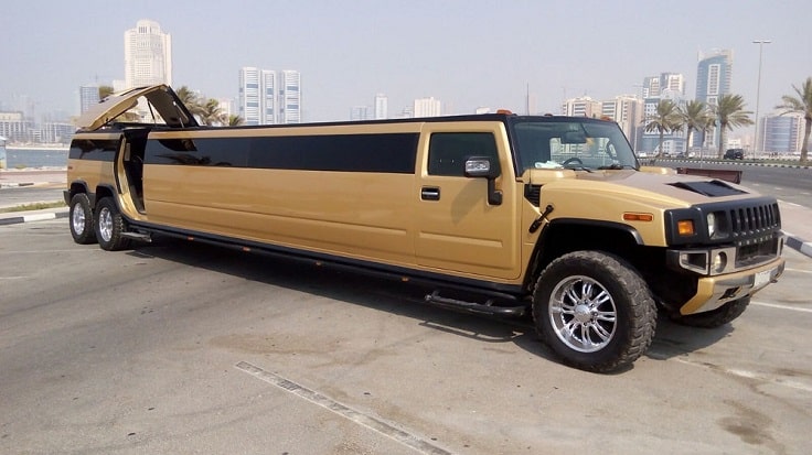 image is showing Gold Hummer Limousine