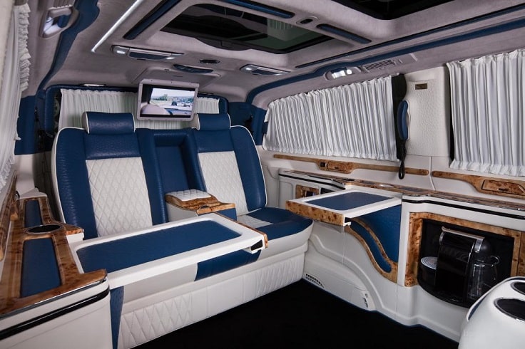 image is showing white and blue luxury interior of limo