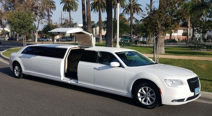 image is showing white stretch Limousine in Palm Springs reach for pick up