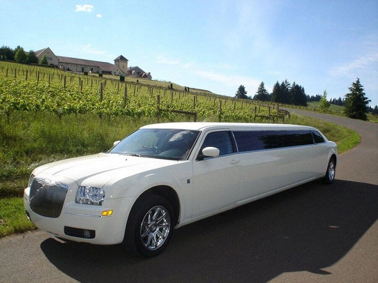 image is showing white Chrysler Limousine in Santa Barbara, California