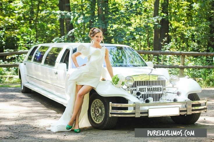 image is showing a bride and old fashion wedding limo in San Francisco